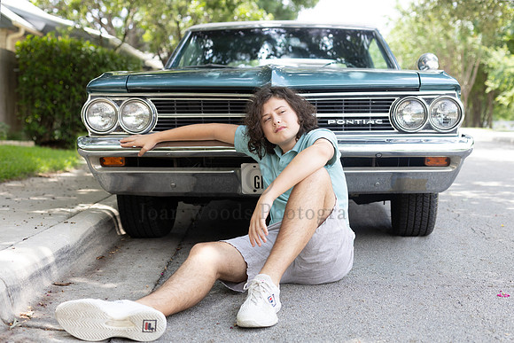 Senior with convertible car
