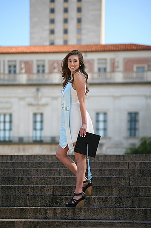 senior in white sundress with cap