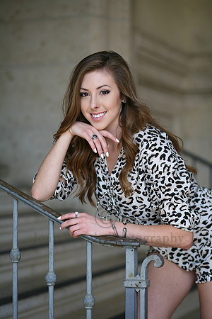 senior posed on UT Tower steps