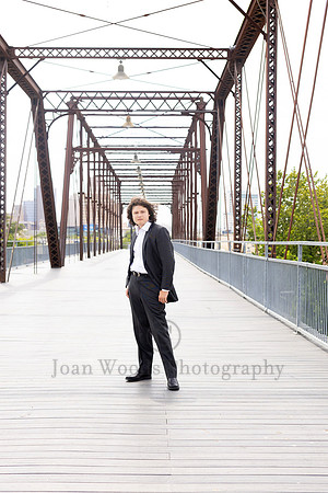 Stylish Formal GQ styled in gray suit senior guy on Hays street Bridge
