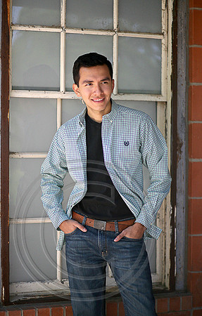 Senior Boy posed by window